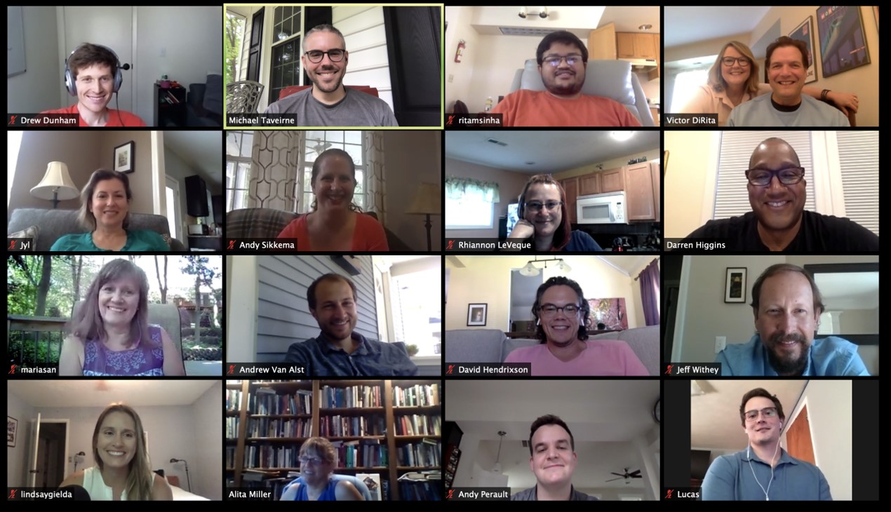 a zoom meeting with a grid of people.