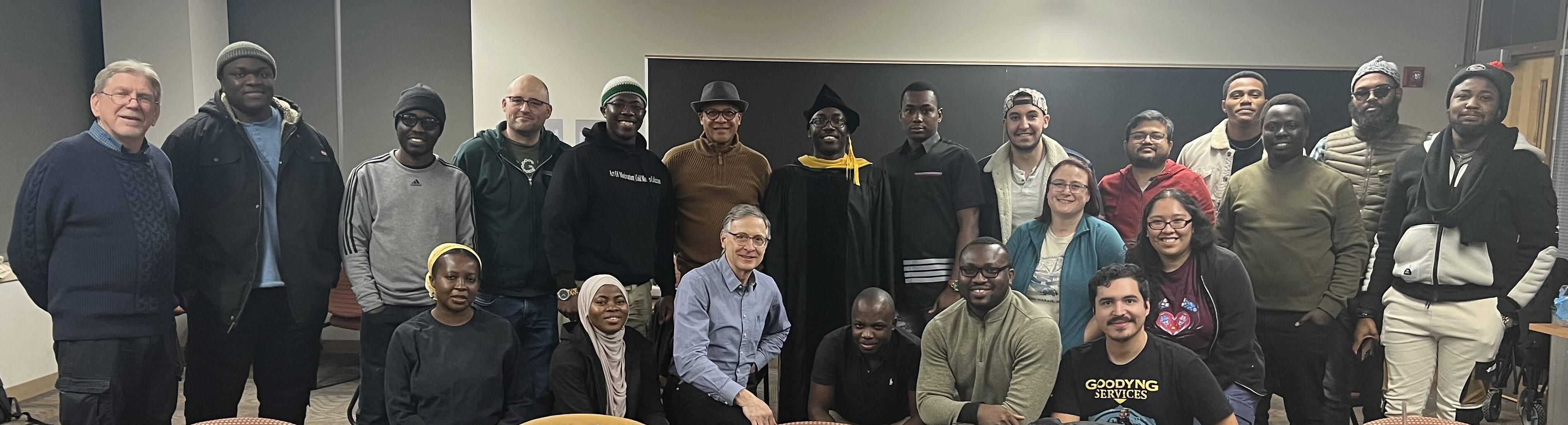 Group photo of the various people from the university and surrounding area gathered to celebrate Ife.